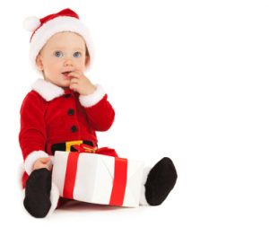 Cute santa baby with beautiful blue eyes on the white background